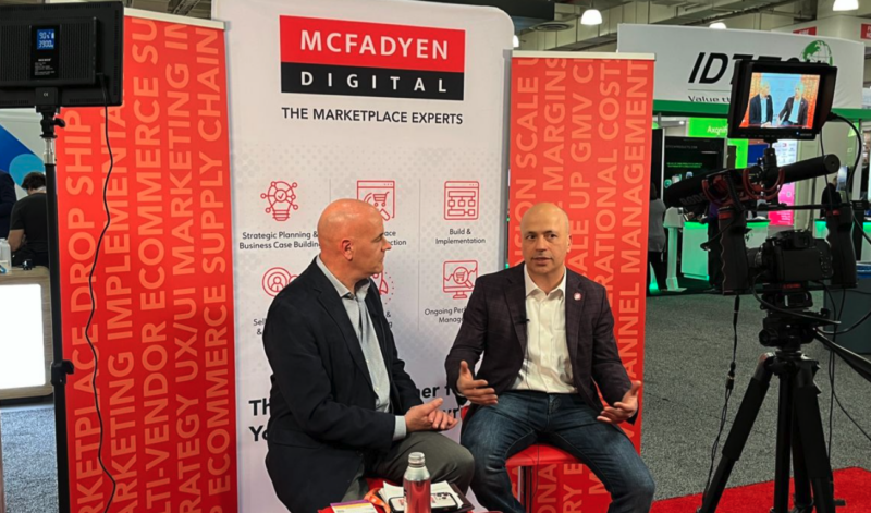Image of Tom McFadyen and Logicbroker CEO Peyman Zamani at McFadyen Digital booth at NRF 2023